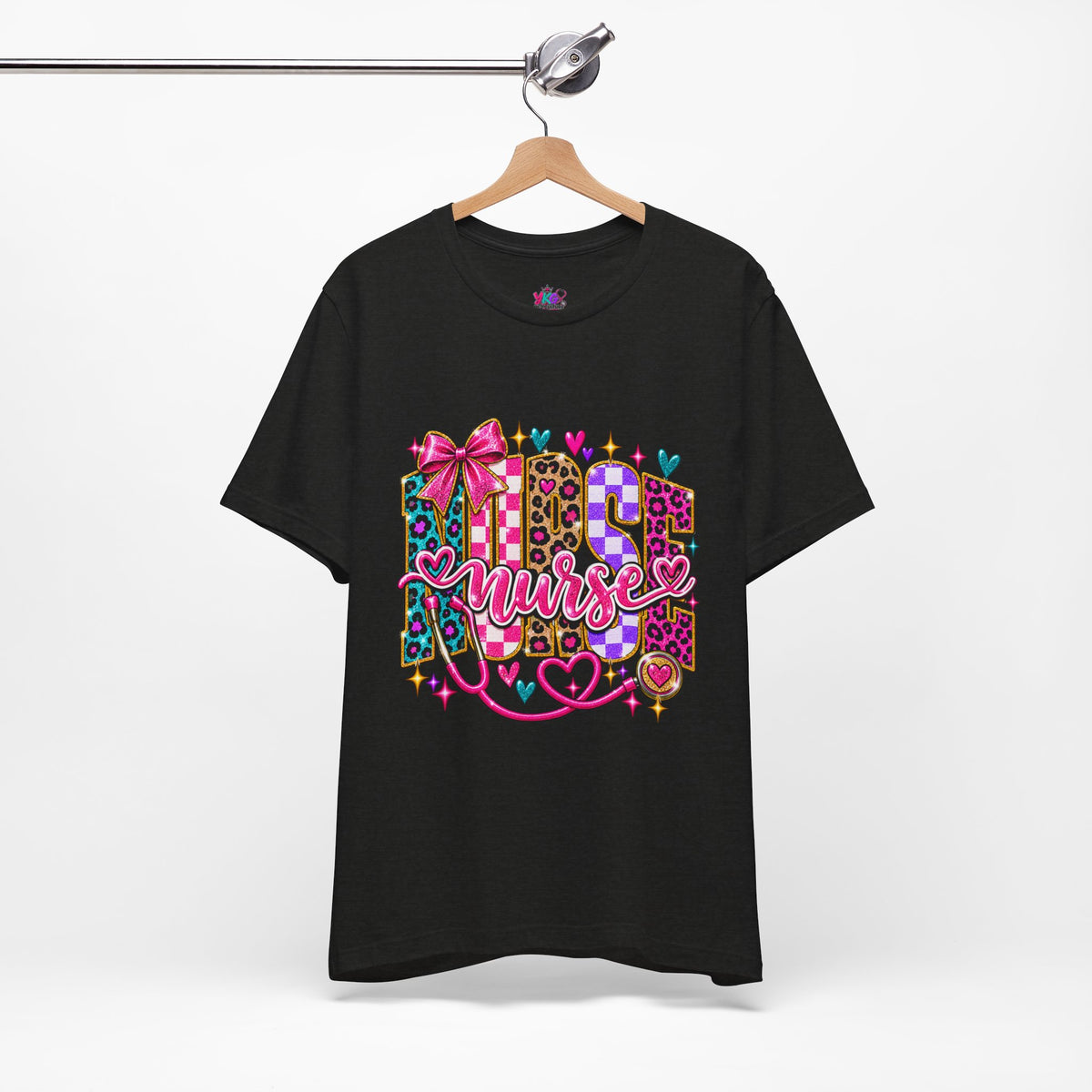 Nurse Graphic Tee — Colorful Leopard Scrub Letters with Hearts & Bow