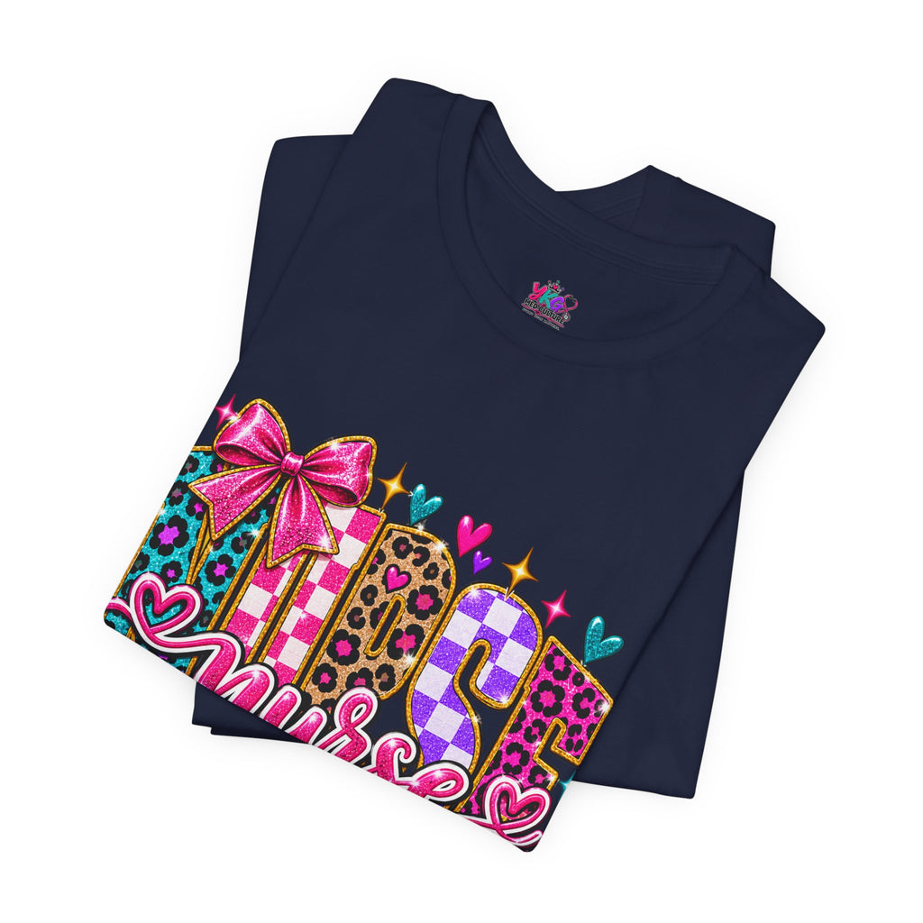 Nurse Graphic Tee — Colorful Leopard Scrub Letters with Hearts & Bow